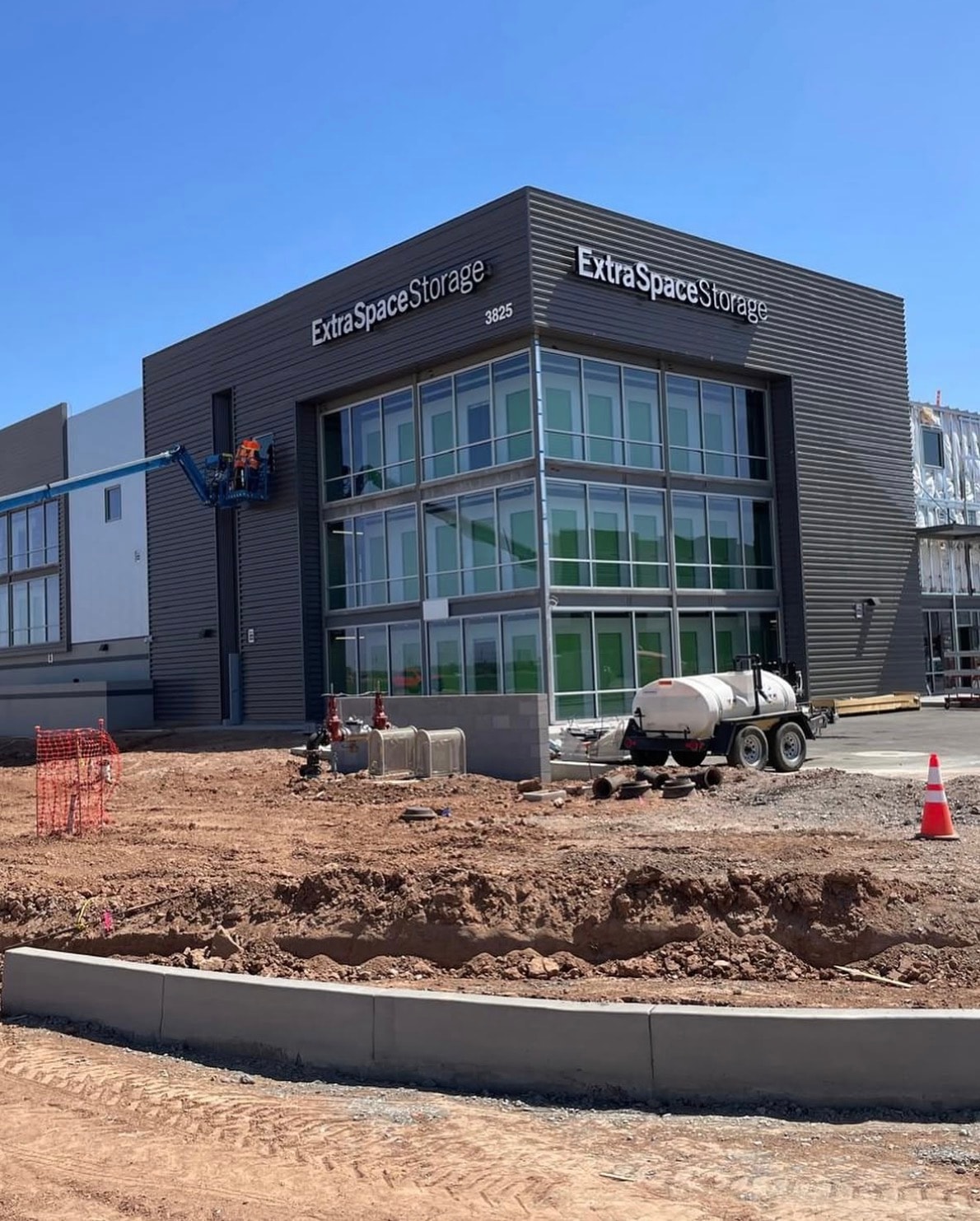 Extra Space Storage building exterior with commercial glass curtain wall by America Glass LLC