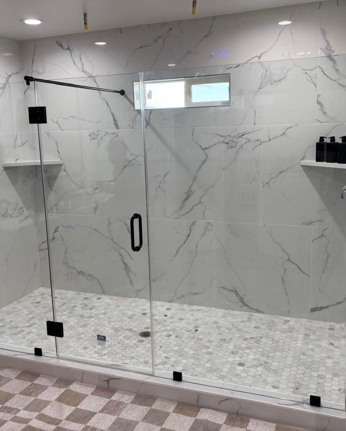 Custom shower door installation by America Glass LLC