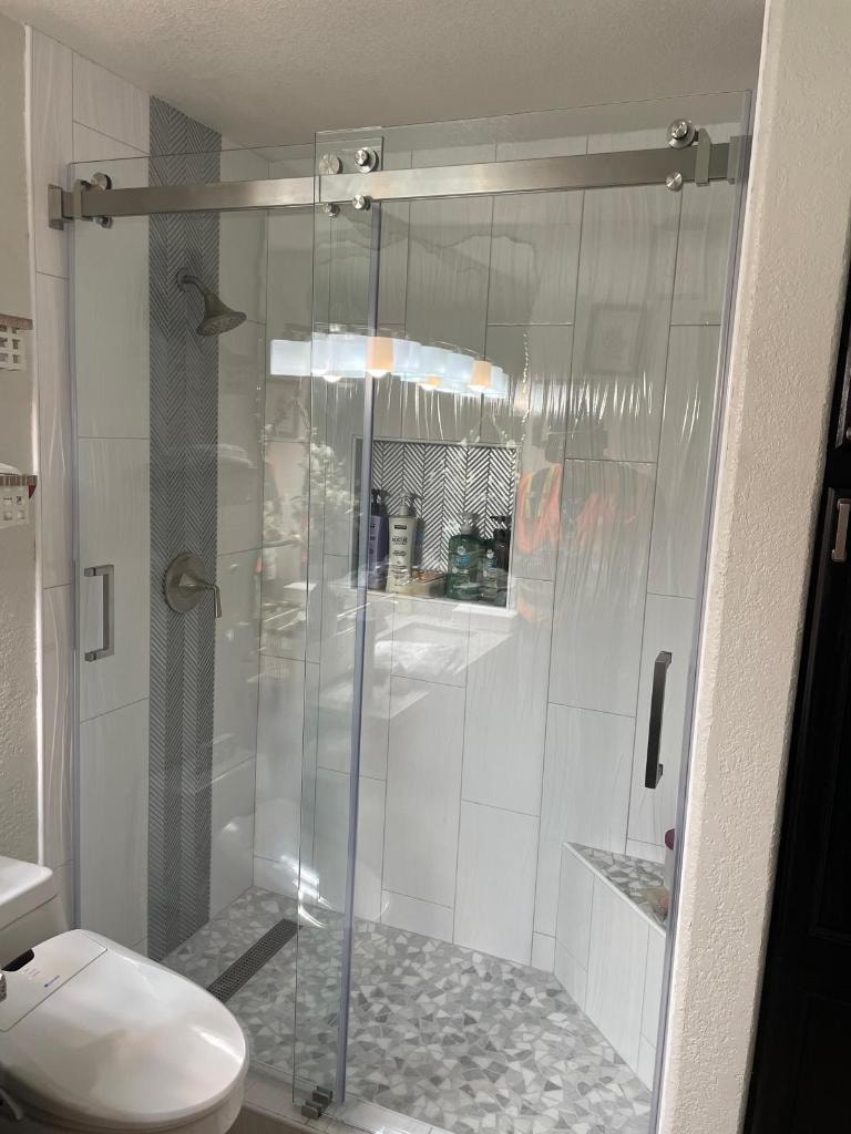 Semi-frameless shower door installation